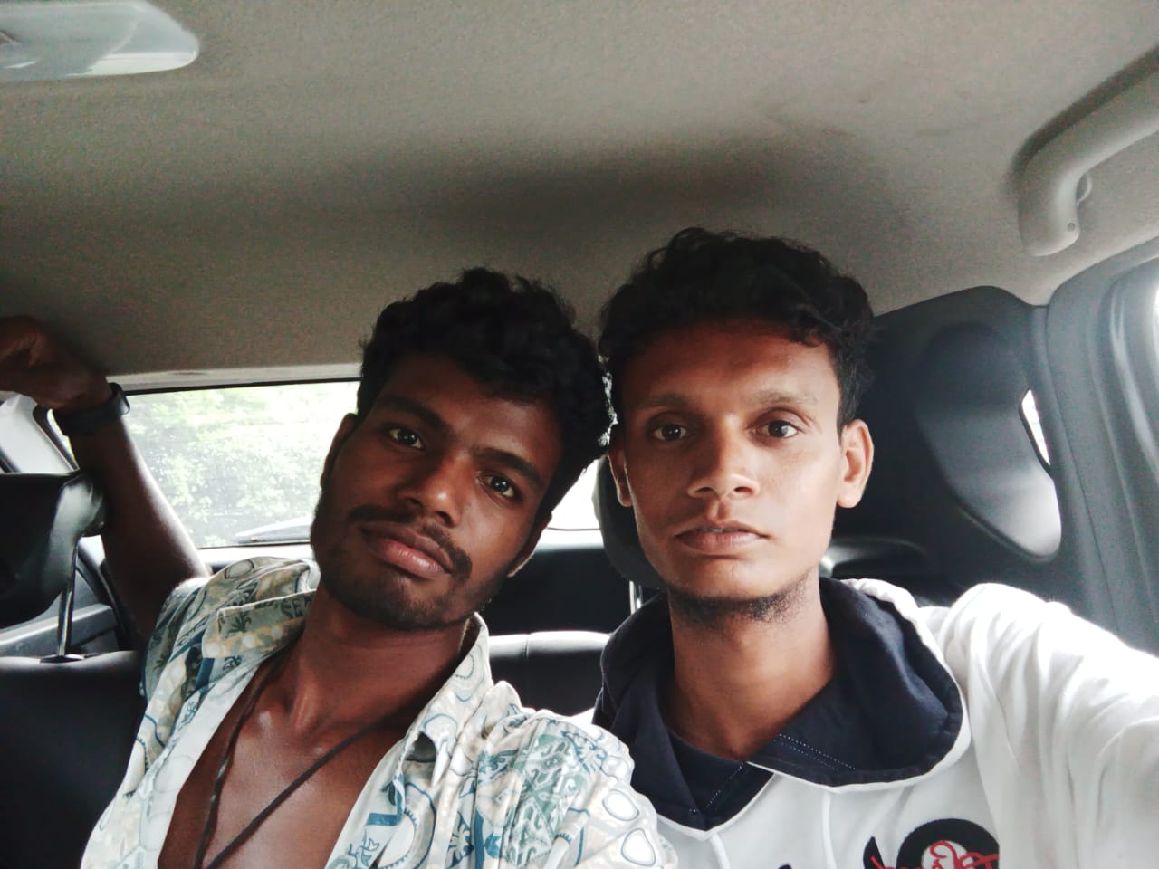 Selfie of Hemath and Surya inside the car